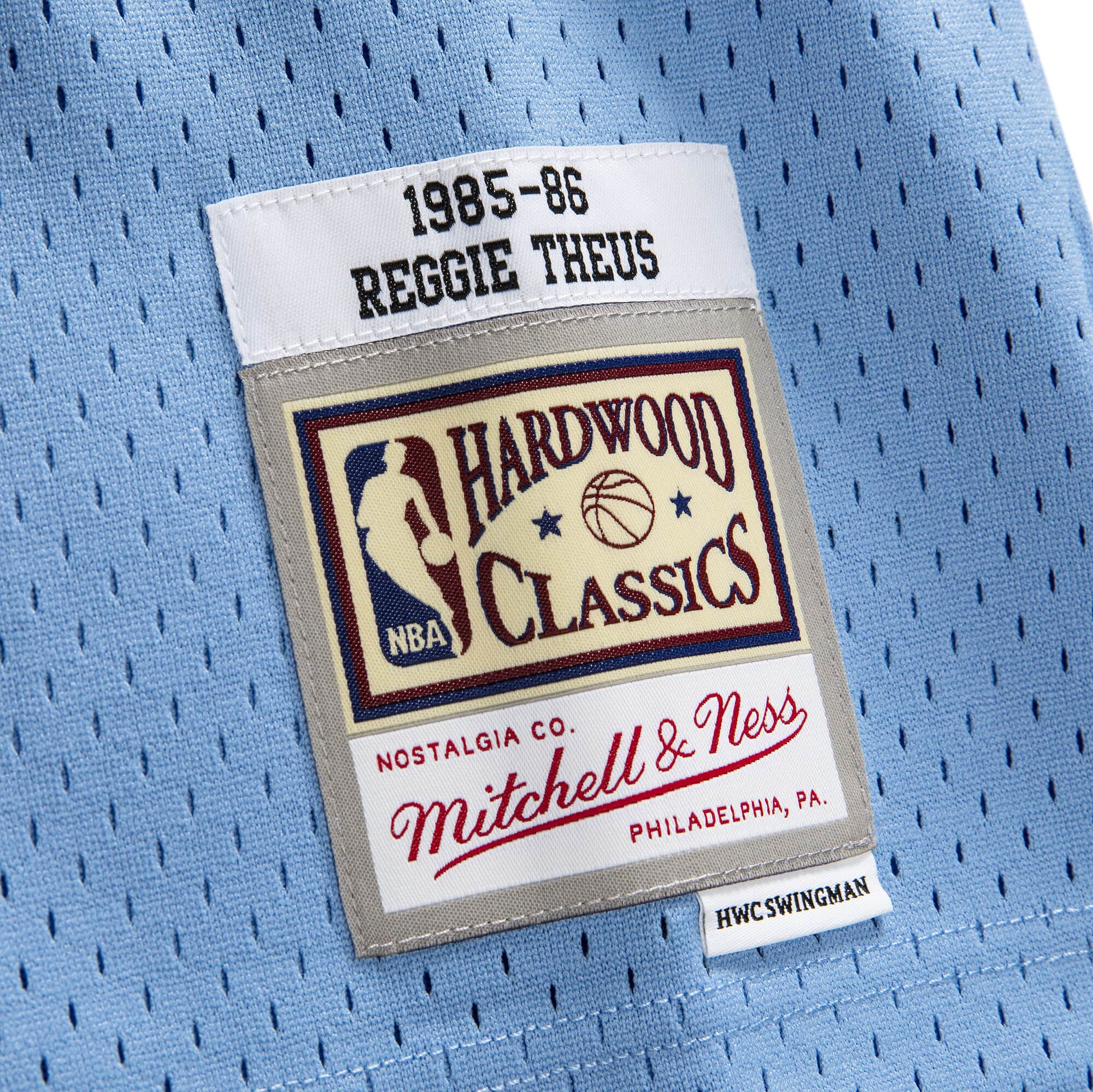 Reggie Theus Sacramento Kings NBA Mitchell & Ness Men's Light Blue 1985-86 Hardwood Classics Swingman Jersey