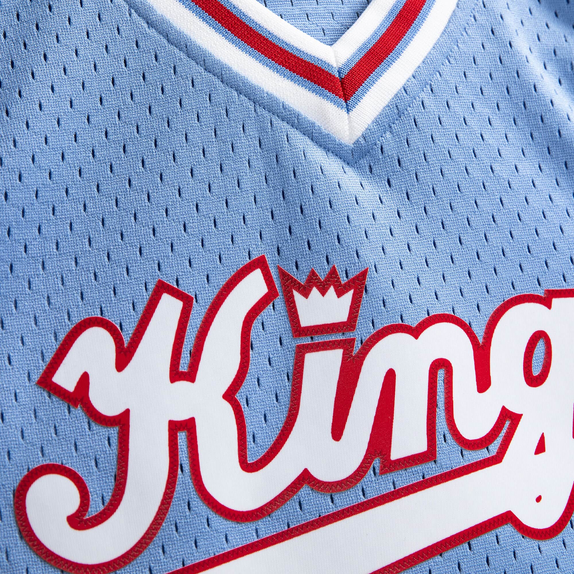Reggie Theus Sacramento Kings NBA Mitchell & Ness Men's Light Blue 1985-86 Hardwood Classics Swingman Jersey