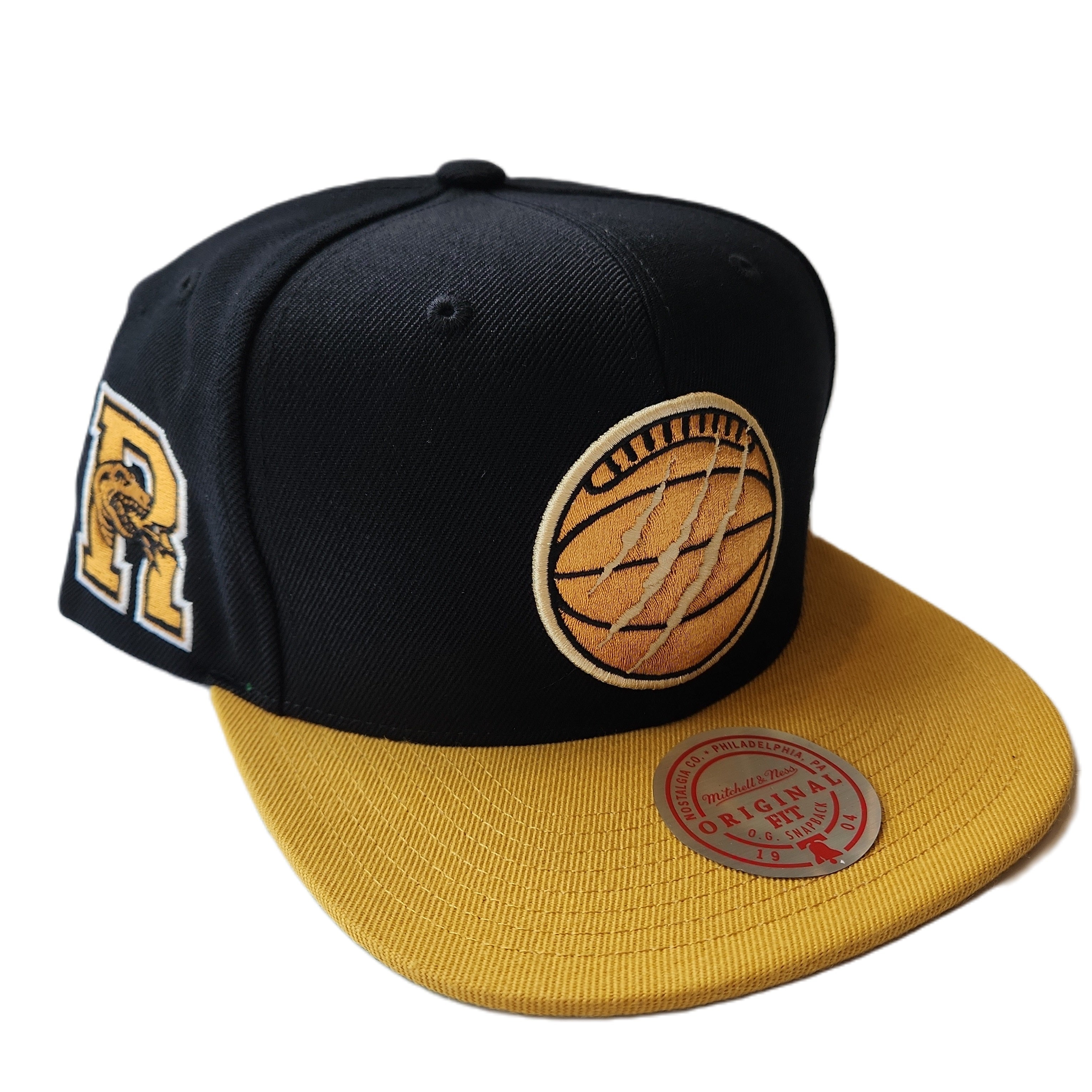 Toronto Raptors NBA Mitchell & Ness Men's Black Eye of The Tiger Snapback