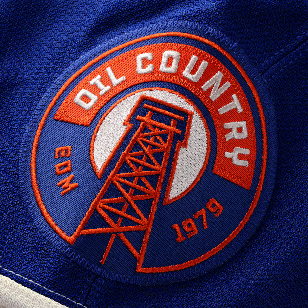 Jersey de hockey beige alternatif pour homme de la marque Fanatics Branded de la NHL, équipe des Oilers d'Edmonton.