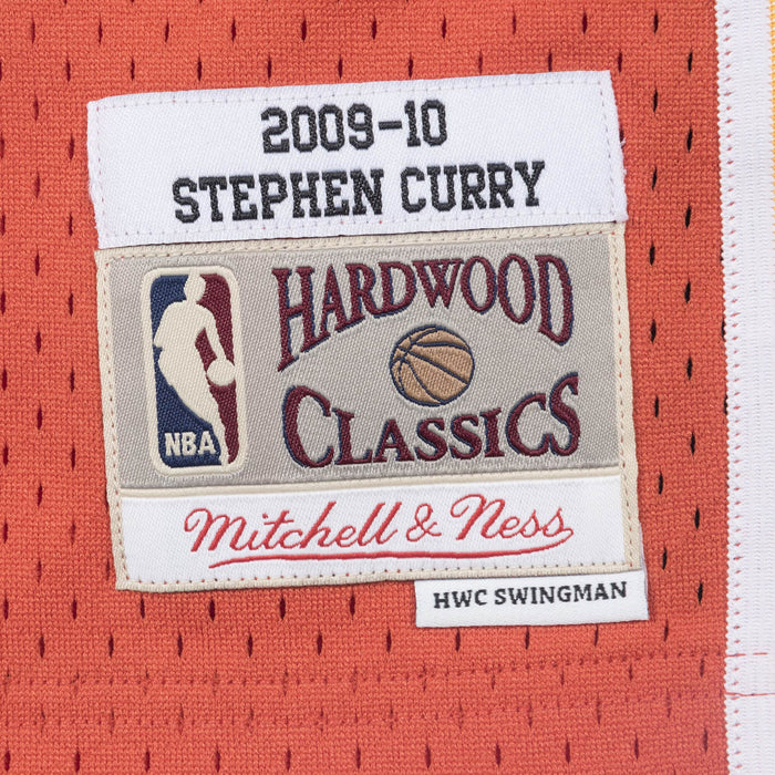 Stephen Curry Golden State Warriors NBA Mitchell & Ness Men's Orange 2009-10 Hardwood Classics Swingman Jersey